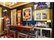 Home bar featuring a black and gold color scheme and stained glass decor at 1409 N Park Ave, Indianapolis, IN 46202