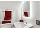 Bright bathroom featuring a modern sink, mirror, toilet and accent towels and decor at 1409 N Park Ave, Indianapolis, IN 46202