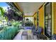 Cozy porch with comfortable seating and hanging planters at 1409 N Park Ave, Indianapolis, IN 46202
