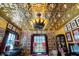Opulent game room featuring custom ceiling, pool table, and vintage advertising art at 1409 N Park Ave, Indianapolis, IN 46202