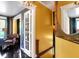 View of the hallway showcasing the home's distinctive architectural details and a glimpse into the comfortably furnished rooms at 1409 N Park Ave, Indianapolis, IN 46202