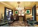Living room view highlighting the vintage style including fireplace, jukebox, and stained glass at 1409 N Park Ave, Indianapolis, IN 46202