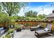 Outdoor patio with lounge chairs, planters, and string lights; great for relaxation and entertaining at 1409 N Park Ave, Indianapolis, IN 46202