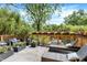 Outdoor patio with lounge chairs, planters, and view of the pool; great for relaxation and entertaining at 1409 N Park Ave, Indianapolis, IN 46202