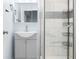 Bathroom featuring a modern vanity, framed mirror, and tiled shower at 150 W Jo Jo Ln, Nineveh, IN 46164