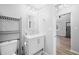 Bathroom featuring a modern vanity with drawers and door leading to the main living area at 150 W Jo Jo Ln, Nineveh, IN 46164
