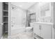 Clean bathroom featuring a shower-tub combination and a vanity with white cabinets at 150 W Jo Jo Ln, Nineveh, IN 46164