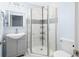 Updated bathroom featuring a glass-enclosed shower with modern fixtures and a white tiled wall at 150 W Jo Jo Ln, Nineveh, IN 46164