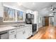 Modern kitchen features stainless steel appliances, gray backsplash, and wood countertops at 150 W Jo Jo Ln, Nineveh, IN 46164