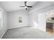 Bright main bedroom with a ceiling fan, large windows, and an ensuite bathroom at 150 W Jo Jo Ln, Nineveh, IN 46164