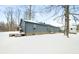 Exterior view of home featuring a deck and peaceful backyard at 150 W Jo Jo Ln, Nineveh, IN 46164