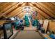 Spacious attic with ample storage space, exposed wooden beams, and great potential for organization and renovation at 15179 Kampen Cir, Carmel, IN 46033