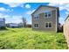 Two-story home featuring a spacious backyard, great for outdoor activities and gatherings at 1624 Prospect St, Indianapolis, IN 46203