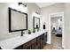 Bright bathroom with a double sink vanity and a bedroom view at 1624 Prospect St, Indianapolis, IN 46203