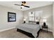 Bedroom featuring a ceiling fan, a window with natural light, and stylish decor at 1624 Prospect St, Indianapolis, IN 46203