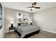 Bedroom features a window with natural light and stylish decor at 1624 Prospect St, Indianapolis, IN 46203