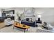 Comfortable living area with stylish decor, seamlessly connected to a modern kitchen at 1624 Prospect St, Indianapolis, IN 46203
