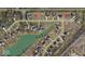Aerial view of neighborhood with mature trees and proximity to green space at 16246 Remington Dr, Fishers, IN 46037
