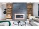 Cozy living room featuring a fireplace, modern accents, and stylish furnishings at 16246 Remington Dr, Fishers, IN 46037