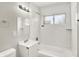 Newly remodeled all-white bathroom with subway tiles and new fixtures at 1651 Lawton Ave, Indianapolis, IN 46203