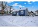 Attractive front yard, displaying the blue home and enhancing curb appeal at 1651 Lawton Ave, Indianapolis, IN 46203