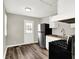 Kitchen featuring modern appliances, wood countertops, and a door leading to the outside at 1651 Lawton Ave, Indianapolis, IN 46203