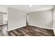 Spacious living room featuring hardwood floors, neutral walls, and great natural light at 1651 Lawton Ave, Indianapolis, IN 46203