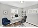 Comfortable office with ample desk space, natural light, and stylish decor at 1651 Lawton Ave, Indianapolis, IN 46203