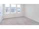 Bedroom featuring neutral carpet and three windows offering lots of natural light and neighborhood views at 18712 Moray St, Westfield, IN 46074