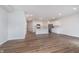 Spacious living area features wood flooring, an open layout, and neutral walls at 18712 Moray St, Westfield, IN 46074