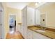 Bathroom features a single vanity, granite countertops providing style and functionality at 2110 Cheviot Ct, Greenwood, IN 46143