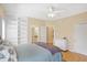 Bedroom featuring a bed, built-in shelves, and neutral tones creating a peaceful retreat at 2110 Cheviot Ct, Greenwood, IN 46143