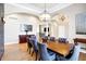 Elegant dining room featuring a hardwood floor and a large wooden table with upholstered chairs at 2110 Cheviot Ct, Greenwood, IN 46143