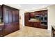 Spacious kitchen featuring custom wood cabinetry, granite counters, and stainless steel appliances at 2110 Cheviot Ct, Greenwood, IN 46143