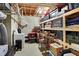 Organized storage room with shelving and various containers for convenient storage at 2110 Cheviot Ct, Greenwood, IN 46143