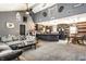 Open living space with vaulted ceilings, gray walls, and blended living, dining, and kitchen areas at 2758 S Lyons Ave, Indianapolis, IN 46241