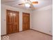 Bedroom with closet doors and a ceiling fan at 2979 Colony Lake E Dr, Plainfield, IN 46168