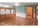 Open kitchen with wood cabinets, a center island, adjacent to a dining area, providing plenty of space at 2979 Colony Lake E Dr, Plainfield, IN 46168