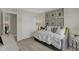 Well-lit bedroom featuring a comfortable bed, animal artwork and closet, offering comfort and functionality at 3302 Wetherby Pl, Danville, IN 46122