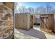 Backyard featuring a shed and gated access, providing ample storage and privacy at 4247 Larkspur Trce, Indianapolis, IN 46237