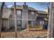 A well-maintained backyard with a wooden deck and a view of the surrounding greenery at 4247 Larkspur Trce, Indianapolis, IN 46237