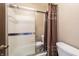 Modern bathroom featuring a glass-enclosed shower, neutral-toned walls, and a stylish, efficient layout at 4247 Larkspur Trce, Indianapolis, IN 46237