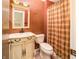 Cozy bathroom featuring a decorative vanity, neutral-toned walls, and a convenient shower-tub combination at 4247 Larkspur Trce, Indianapolis, IN 46237