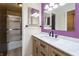 Modern bathroom features stylish vanity with marble countertop, sleek fixtures, and updated lighting and a standup shower at 4247 Larkspur Trce, Indianapolis, IN 46237