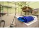Practical laundry room with wire shelving and in-unit washer and dryer at 4247 Larkspur Trce, Indianapolis, IN 46237