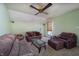 Relaxing living room with plush sofas, ambient lighting, and a window that offers a cozy and inviting space at 4247 Larkspur Trce, Indianapolis, IN 46237
