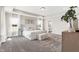 Large primary suite showcasing tray ceilings, a neutral palette, and generous natural light at 449 Hidden Hills Dr, Pittsboro, IN 46167