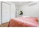 Bright bedroom offers a large closet and a cozy bed at 509 St Paul St, Indianapolis, IN 46203