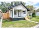 This home features a well-kept lawn, classic siding, and inviting front porch at 509 St Paul St, Indianapolis, IN 46203