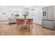 This modern dining area blends seamlessly with the living space, featuring stainless steel appliances at 509 St Paul St, Indianapolis, IN 46203